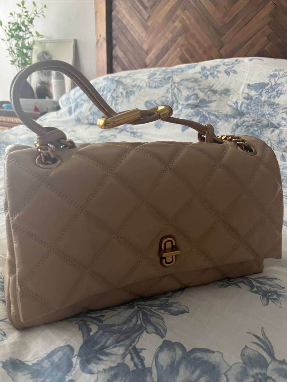 Marc Jacob’s Quilted Top-Handle Shoulder Bag in Beige